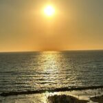 הנוף של השקיעה מפנינה בים בחיפה